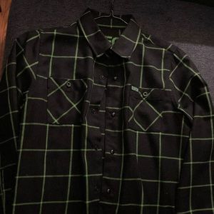 DIXXON FLANNEL CO.  YOUTH MEDIUM LONG SLEEVE BUTTON DOWN FLANNEL SHIRT.